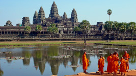 Buddhist monks in front of Angkor Wat, Cambodia, Asia yacht charter